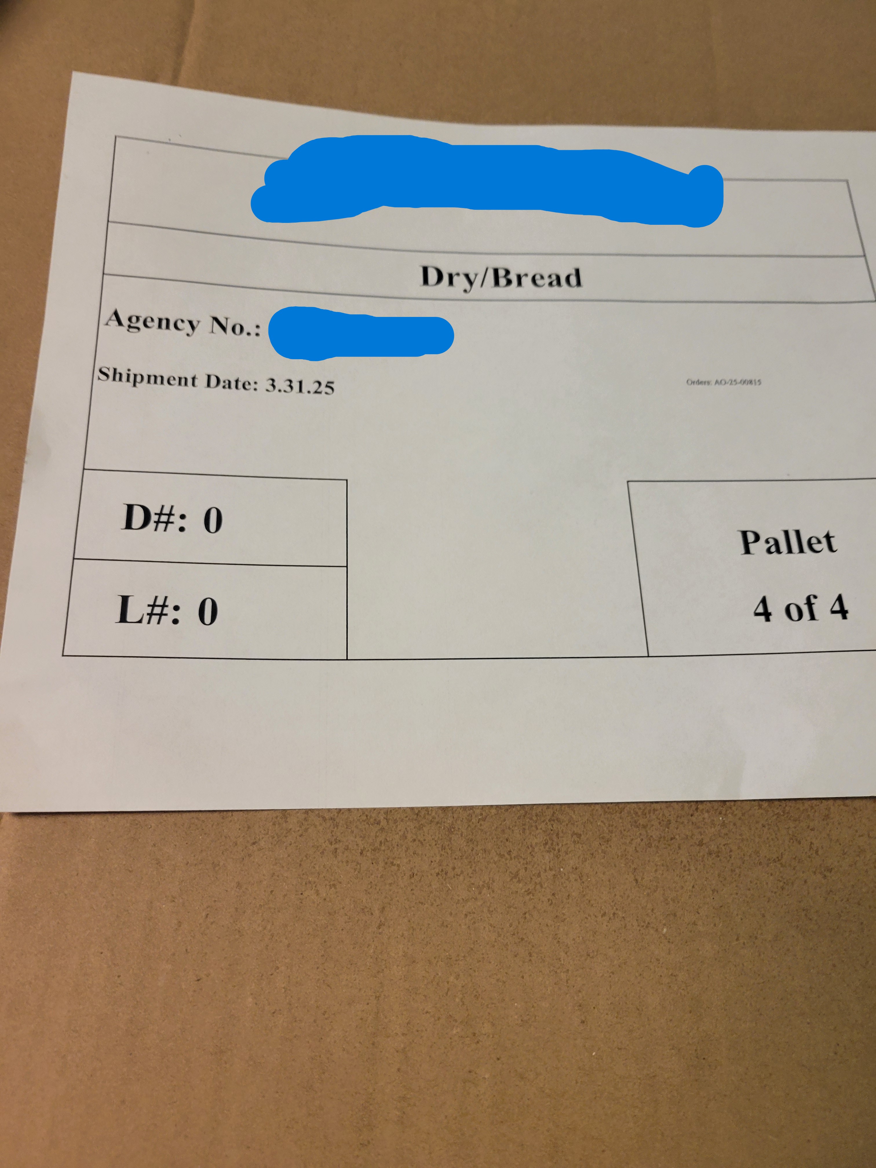 Piece of paper listing what product it is, order number, agency number, and shipment date.